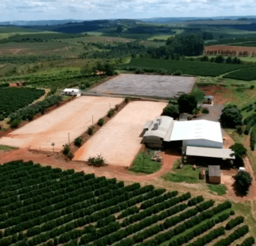 Aerial view of the Eagle Monte Carmelo estate and drying patios in the Cerrado Mineiro, Brazil